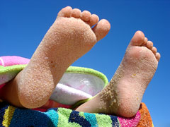beach blanket and toes
